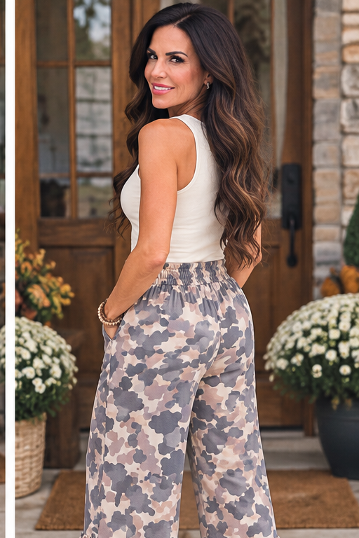 Side modeled view of neutral camo ruffle wide-leg pants